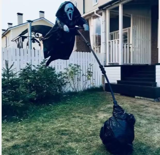 Life-Size Animated Hanging Ghost: Glowing Eyes Halloween Prop